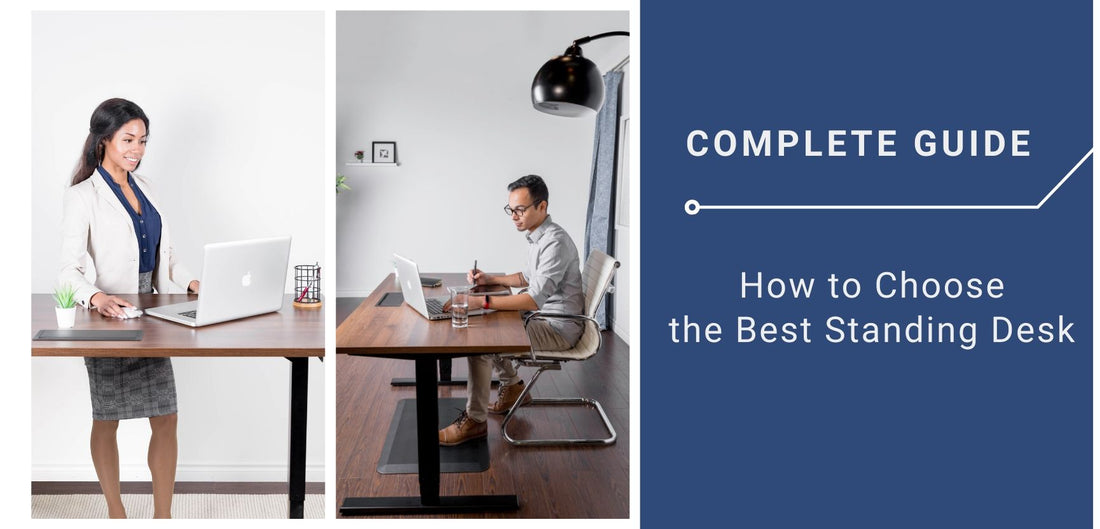 Photo of a woman and man working for standing desk 