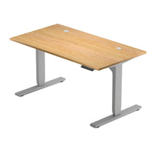 table top with two bushing grommet cutouts and gray standing legs