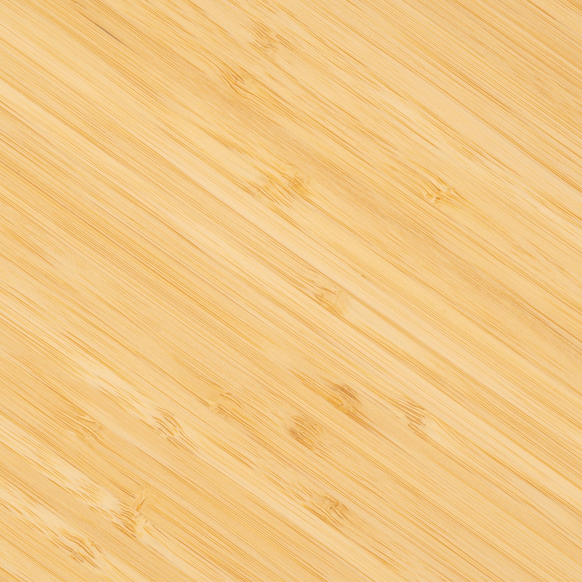 Light wood sheet with pre-drilled holes and threaded inserts visible